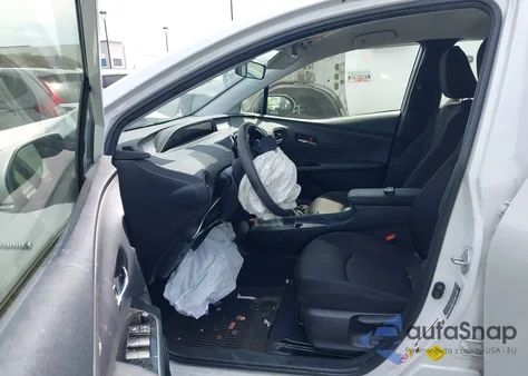 2021 Toyota Prius Le z USA, uszkodzony, nr VIN JTDKAMFU8M3134511